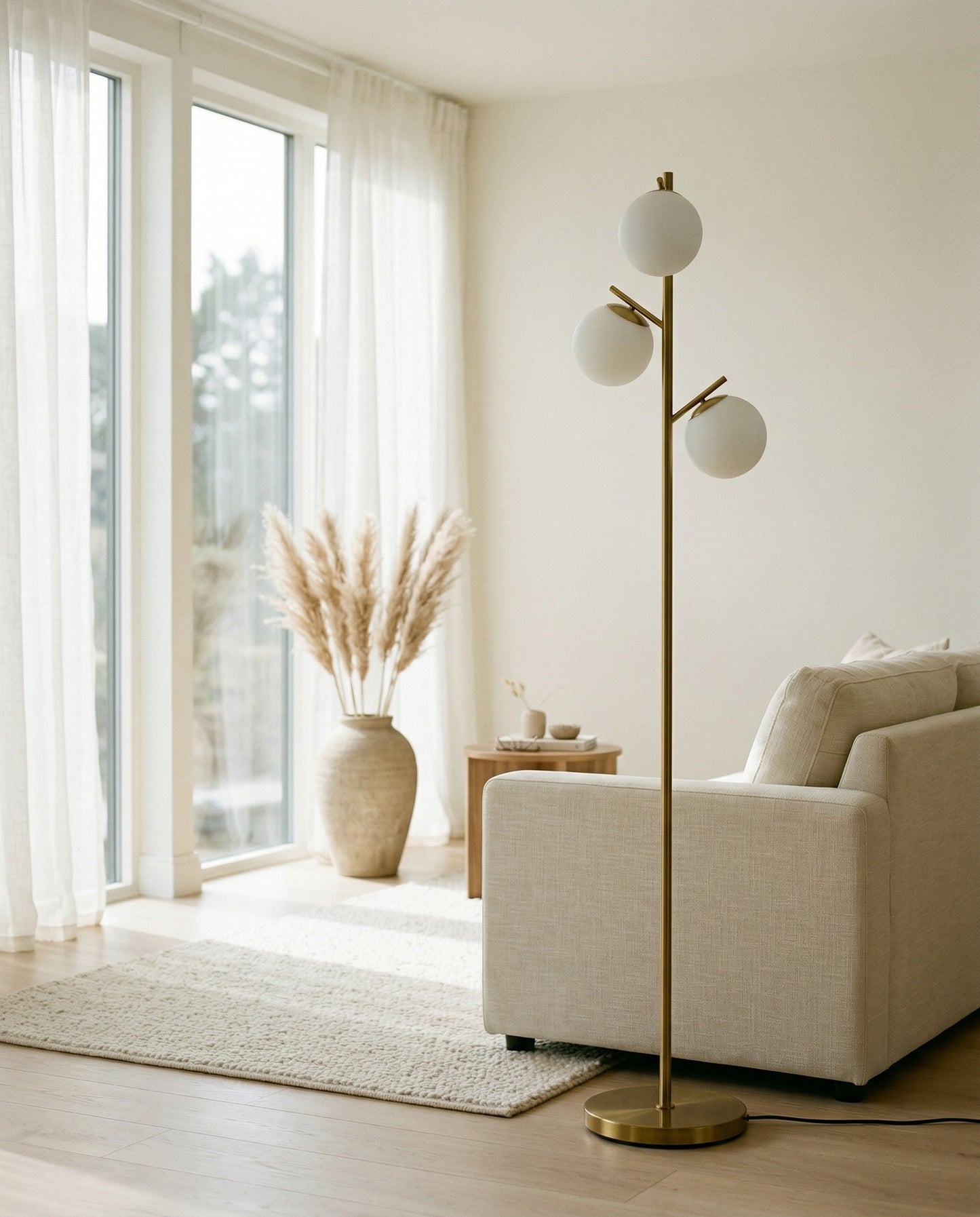 Tryst Floor Lamp modern design casting warm amber light in room